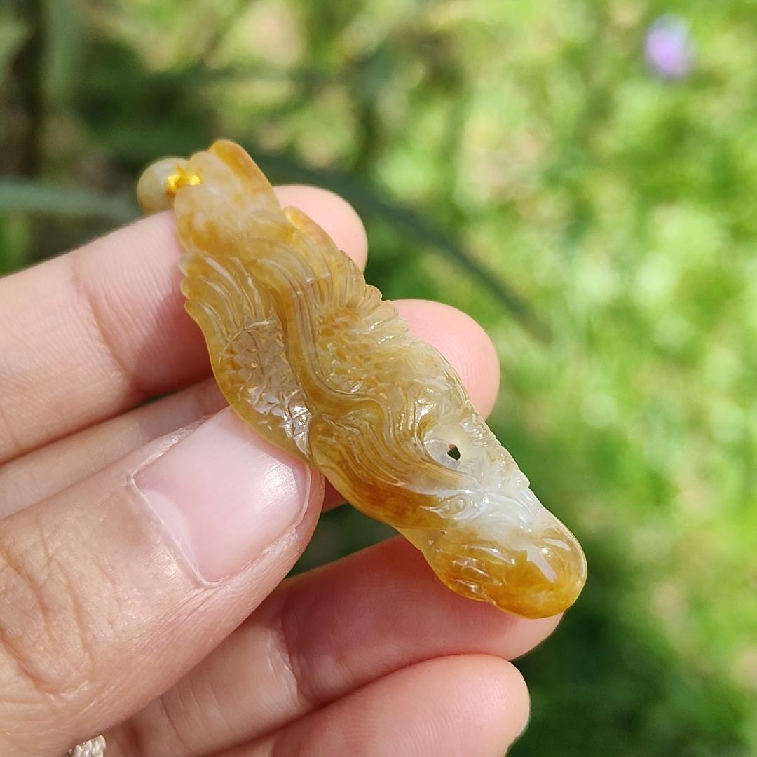 Yellow Natural Type A Jadeite crafted with Eagle and Chinese Coins symbols of Winner, Money and Luck, with QIC labs Approved certificate weigh 8.21 grams, 49.8 * 15.5 * 8.1 mm, very suitable for daily wear Yi Pin Qian