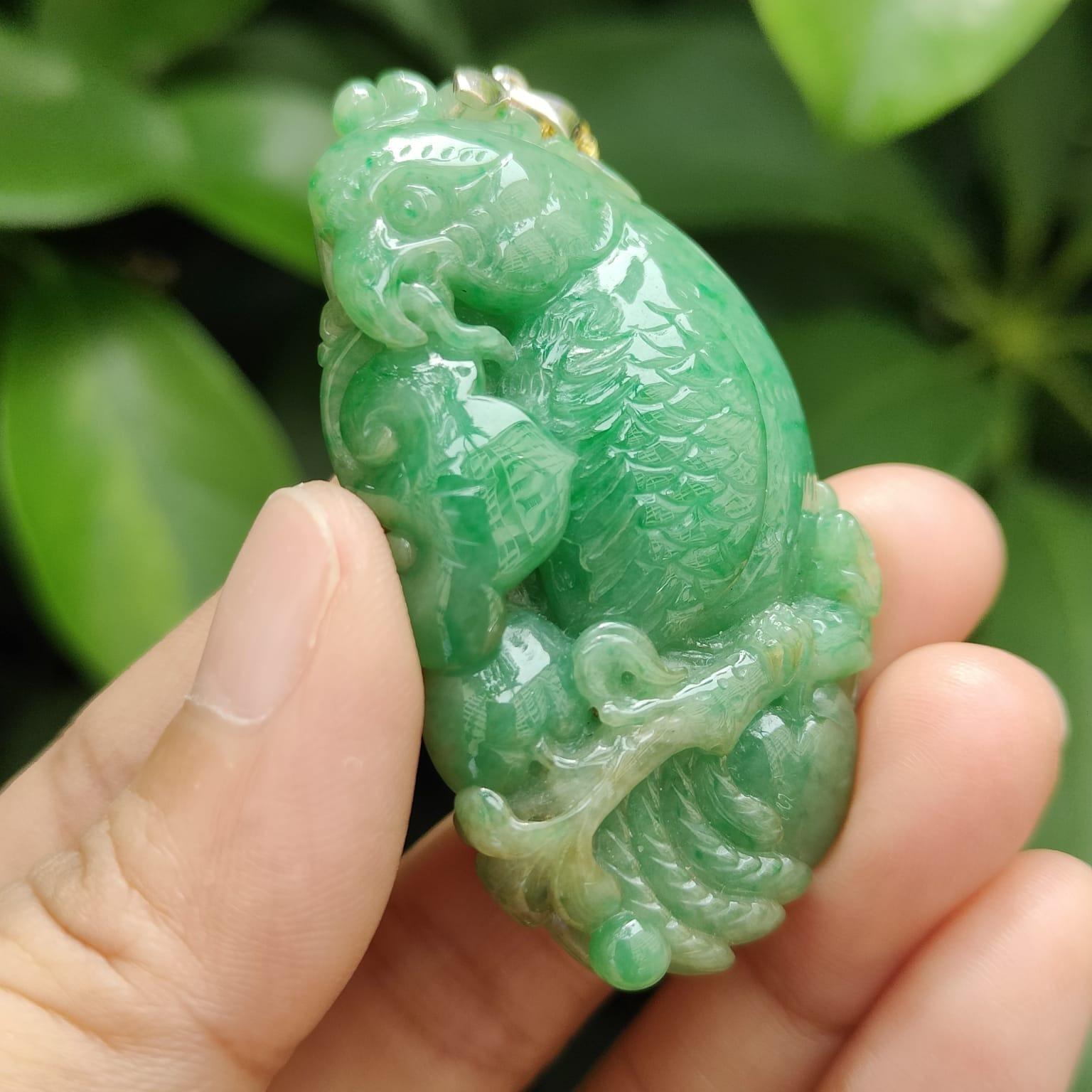 Green Natural Type A Jadeite Jade crafted with Parrot with Ruyi and Coin as Pendant, ceritificate weighs 22.55 grams, measurement 54.6 * 30 * 9.2 mm (pendant332) Yi Pin Qian Jadeites Jade Jewelry ~Your Precious Quintessential ~ Singapore