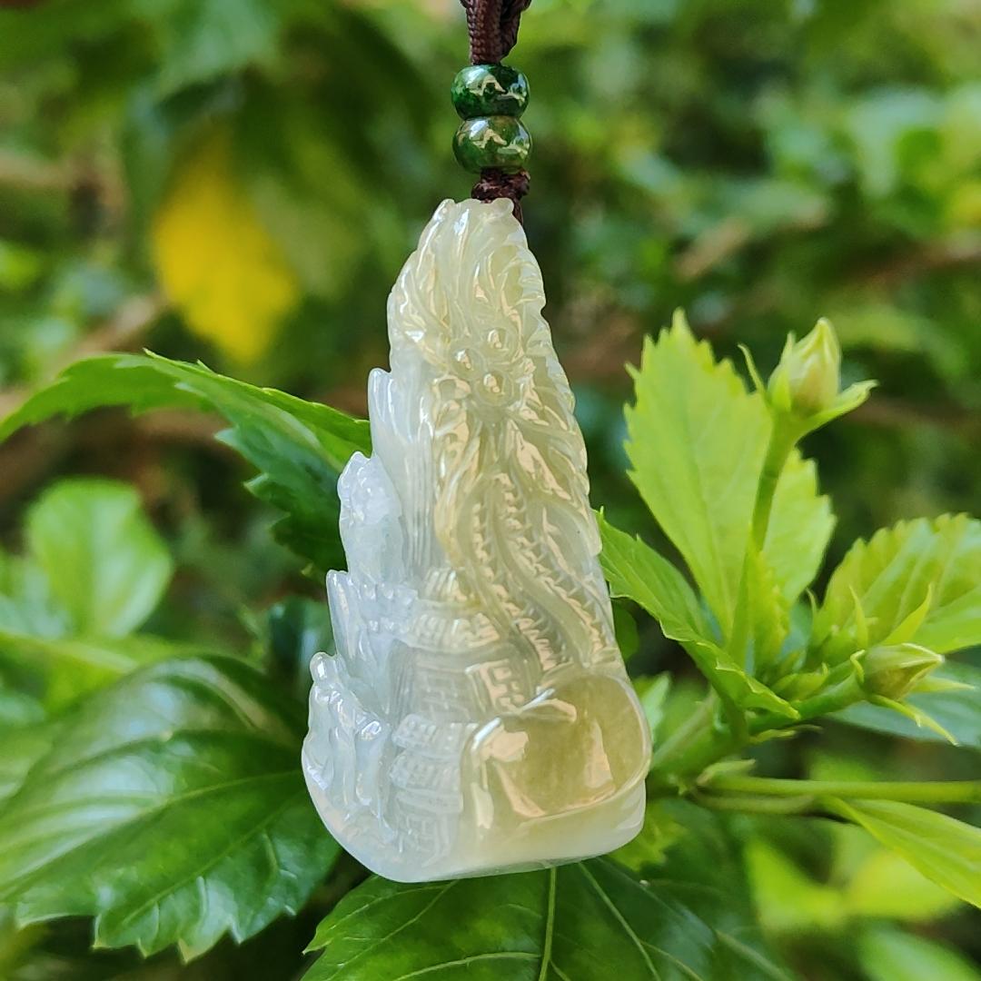 Very Unique and Rare Light Purple with Yellow Natural Type A Jadeite Pendant Crafted with waterfall, moutain, houses and coconut trees, symbols of money, power of life, Extend upwards with certificate weigh 31.55 grams, 49 * 32.3 * 13.5 mm, (pendant70) Yi Pin Qian