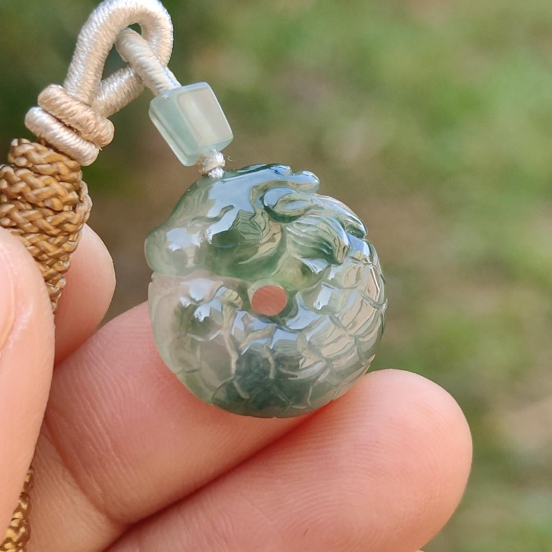 #Sold - High Quality Green with Green Patches Natural Type A Jadeite Jade crafted with shape of Donut with Baby Dragon as Pendant, QIC approved labs certificate weigh 4.11 grams, measurement 17.2 * 16.3 * 5.1 mm (pendant242)