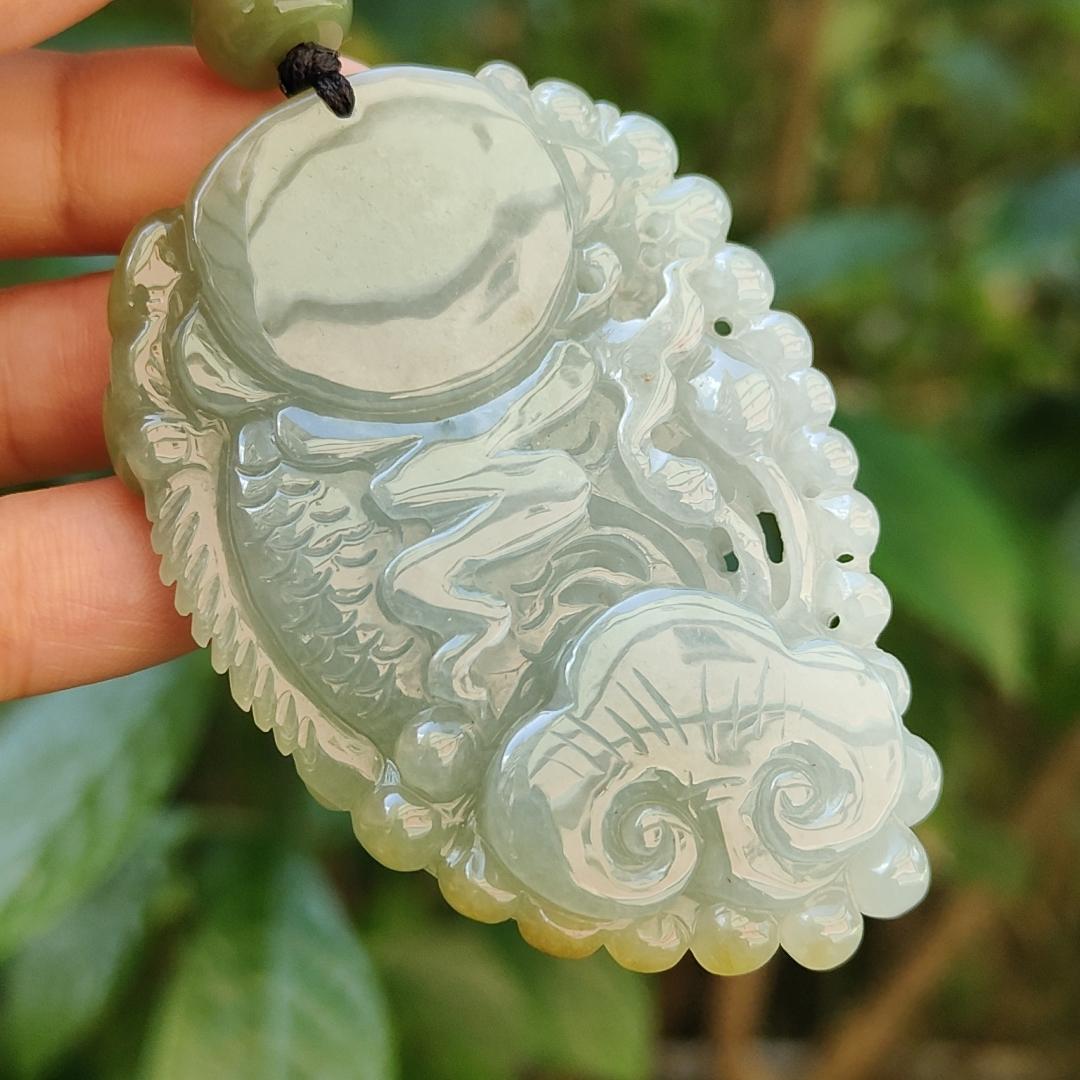 Tea Green Yellow Natural Type A Jadeite Pendant Carved as Dragon Head Fish Body meaning Prosperity, wealth and happiness with certificate weighs 49.67 grams, 62.60 * 43.50 * 12.10 mm (pendant93) Yi Pin Qian