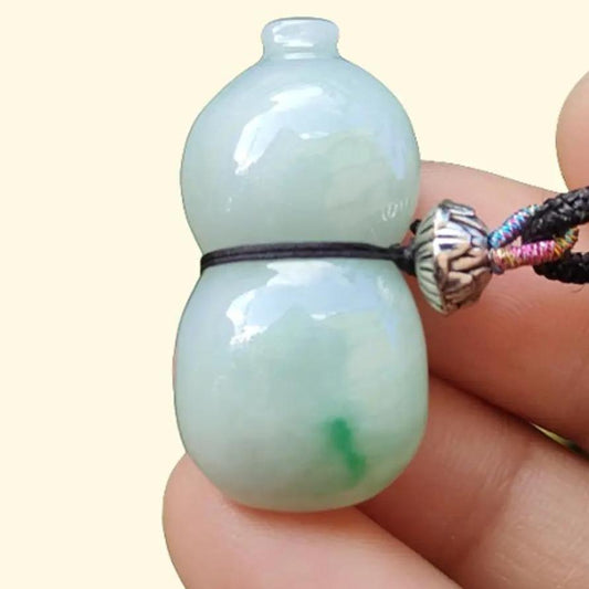Light Green Natural Type A Jadeite Jade crafted with shape of Gourd as Pendant, certificate weighs 8.42 grams, measurement 32.9 * 16 * 8.4 mm(pendant252) Yi Pin Qian