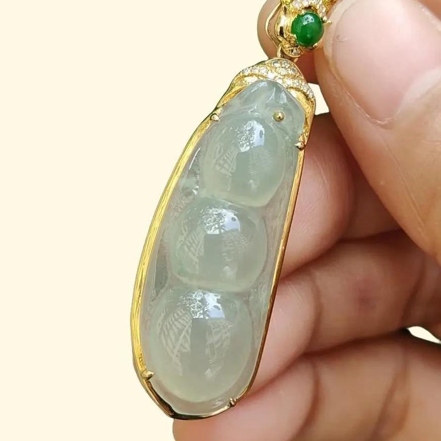 High Quality Good Translucent Light Green Hue Natural Type A Jadeite Jade Crafted as Bean, set on 18k gold as Pendant Necklace certificate weighs 6.88 grams (18kp68) Yi Pin Qian Jadeites Jade Jewelry ~Your Precious Quintessential ~ Singapore