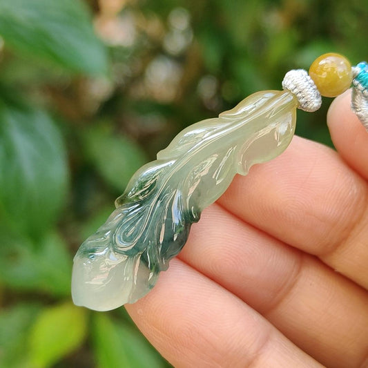 Green with Yellow two colors Natural Type A Jadeite Pendant carved as the Phoenix feather with QIC approved labs certificate weighs 5.83 grams, 40.2 * 12.7 * 4.8 mm, phoenix feather Symbol of Prosperity and Wealth, Harmony Bliss in Marriage (pendant82) Yi Pin Qian