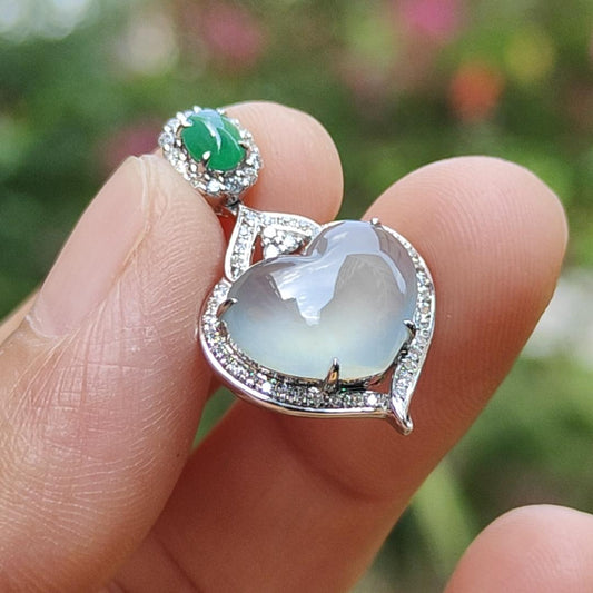 Highly Translucent Heart Shape Natural Type A Jadeite pendant, set with 18k Gold with 1 green cabochon weight 2.27 gram, 10.70 * 12.51 * 4.05mm, with NGI report, colorless (18kp6) Yi Pin Qian