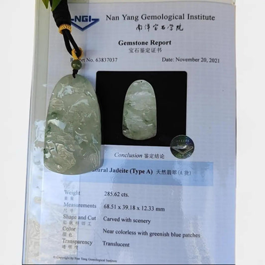 Natural Old Mine Type A Jadeite Pendent Carved with scenery with NGI Gemstone report weighs 285.62 grams 68.51 * 39.18 * 12.33 mm - Good Translucency with 3.34 Specific Gravity - Near Colorless with greenish blue patches pendant (pendant148) Yi Pin Qian