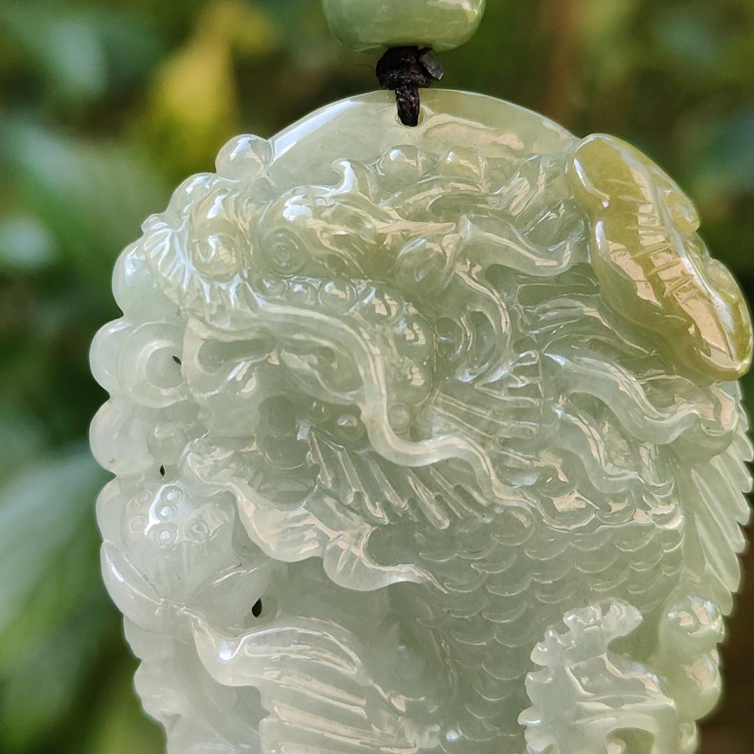 Tea Green Yellow Natural Type A Jadeite Pendant Carved as Dragon Head Fish Body meaning Prosperity, wealth and happiness with certificate weighs 49.67 grams, 62.60 * 43.50 * 12.10 mm (pendant93) Yi Pin Qian