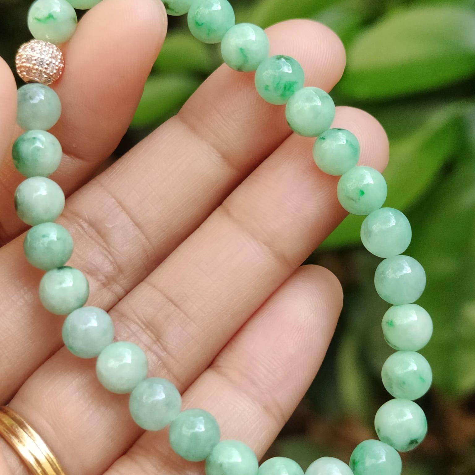 28 * 6.3 mm Light green with green patches beads Natural Type A Jadeite Jade bracelet, certificate weighs 12.64 grams (bracelet40) Yi Pin Qian Jadeites Jade Jewelry ~Your Precious Quintessential ~ Singapore