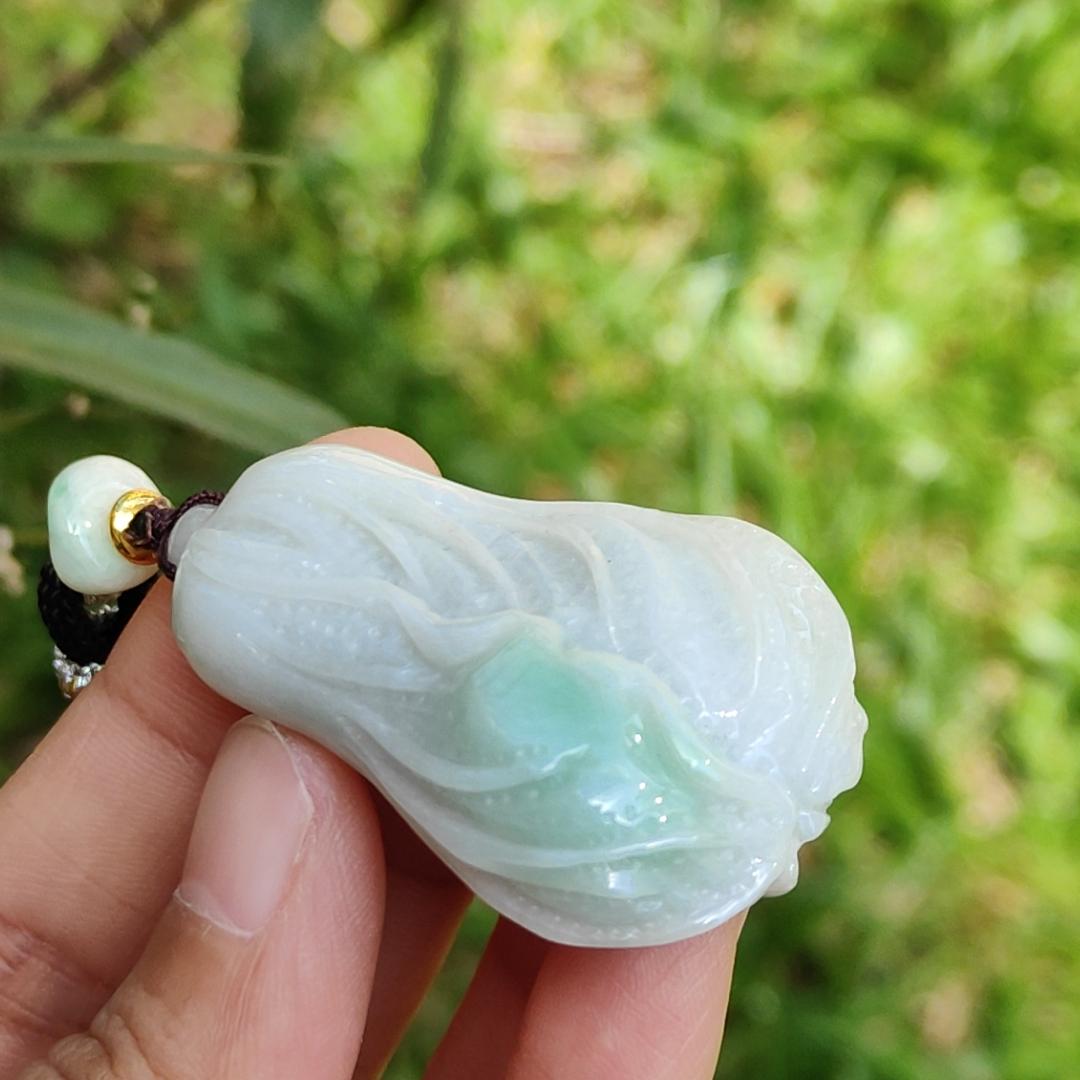 Crafted as Chinese cabbage with patches of light green Natural Type A Jadeite Pendant Necklace with QIC approved labs certificate weigh 31.92 grams, 46.8 * 27.3 * 18 mm, symbols of Boosts wealth, purity, and good weather, suitable for daily wear Yi Pin Qian