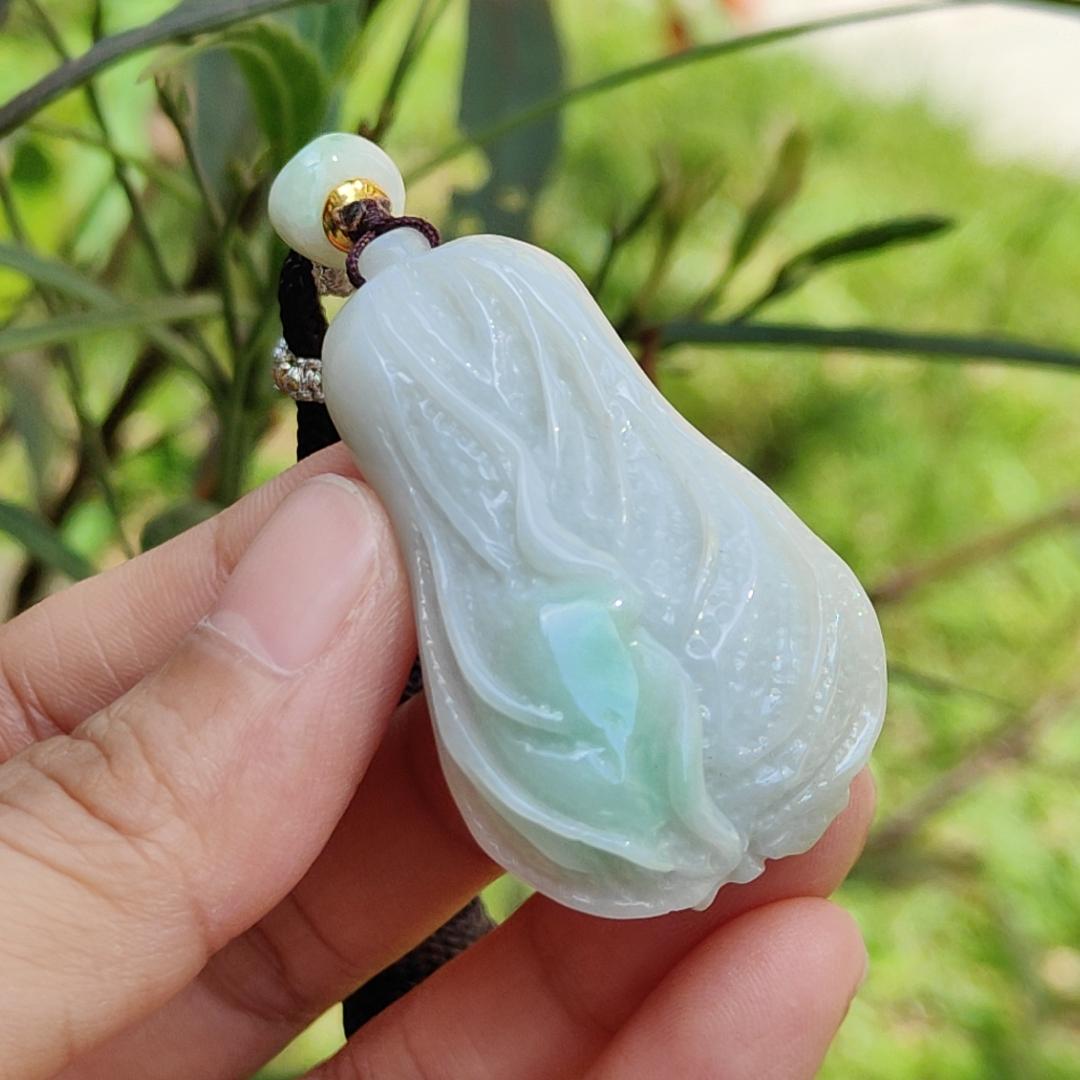 Crafted as Chinese cabbage with patches of light green Natural Type A Jadeite Pendant Necklace with QIC approved labs certificate weigh 31.92 grams, 46.8 * 27.3 * 18 mm, symbols of Boosts wealth, purity, and good weather, suitable for daily wear Yi Pin Qian