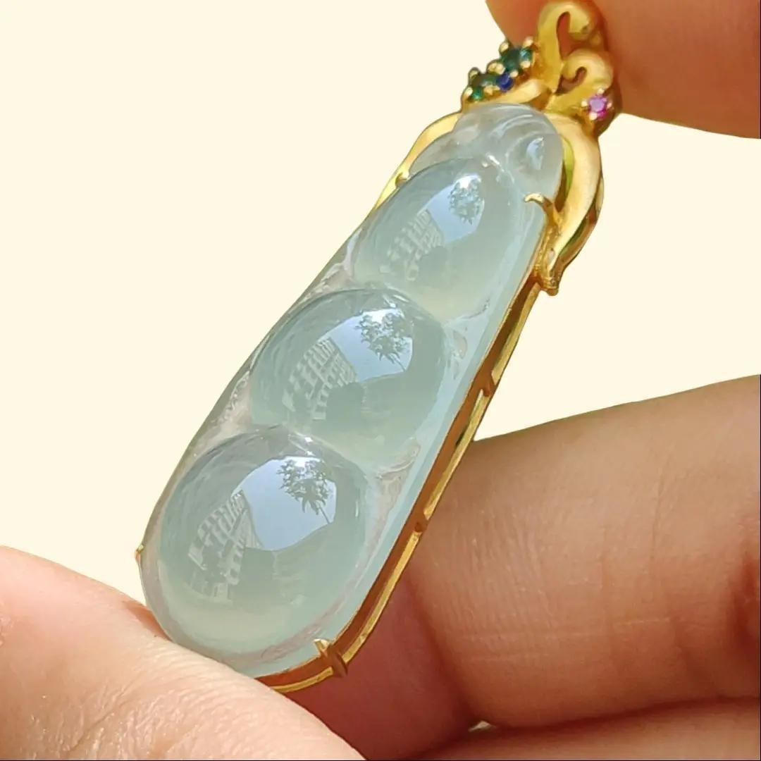 Icy Translucent Premium Quality Natural Type A Jadeite Jade crafted as Bean set on 18k Gold as Pendant, certificate weighs 5.31 grams, measurement 40.6 * 12 * 8 mm (18kp52) Yi Pin Qian