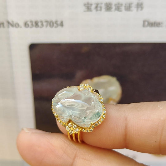 Highly Translucent Icy Variety Natural Type A Jadeite with NGI Gemstone report 18k Gold Jadeite Ring with Diamonds carved as pixiu weighs 5.01 grams , 15.23 * 11.57 * 5.60 mm , Internal Diameter Finger size = 15.2mm (18kring11) Yi Pin Qian