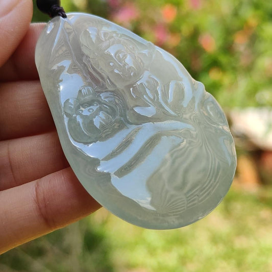 Highly Translucent Icy Variety Colorless to Faint Green Natural Type A Jadeite pendant with NGI Gemstone report weight 166.49 grams , 61.01 * 39.56 * 7.57 mm carved as Guanyin has good translucency with very fine grain crystal aggregate(pendant147) Yi Pin Qian