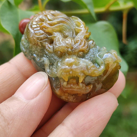 Green and Brown Two Colours Natural Type A Jadeite Pendant carved as Dragon with certificate weighs 33.15 grams, 41.8 * 26.5 * 16.5 mm, meaning Power and dignity, spirit of courage and perseverance, Prosperity and wealth (pendant88) Yi Pin Qian