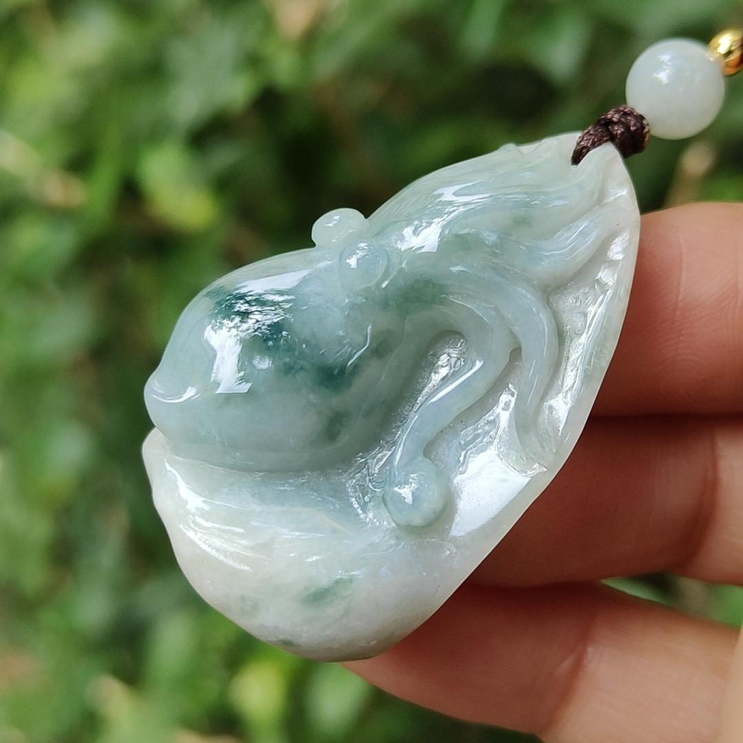Crafted as Octopus Pendant on Natural Type A Jadeite Jade with rough skin certificate weighs 20.48 grams, measurement 38.6 * 20.3 * 17 mm (pendant354) Yi Pin Qian Jadeites Jade Jewelry ~Your Precious Quintessential ~ Singapore
