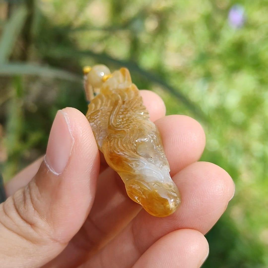 Yellow Natural Type A Jadeite crafted with Eagle and Chinese Coins symbols of Winner, Money and Luck, with QIC labs Approved certificate weigh 8.21 grams, 49.8 * 15.5 * 8.1 mm, very suitable for daily wear Yi Pin Qian