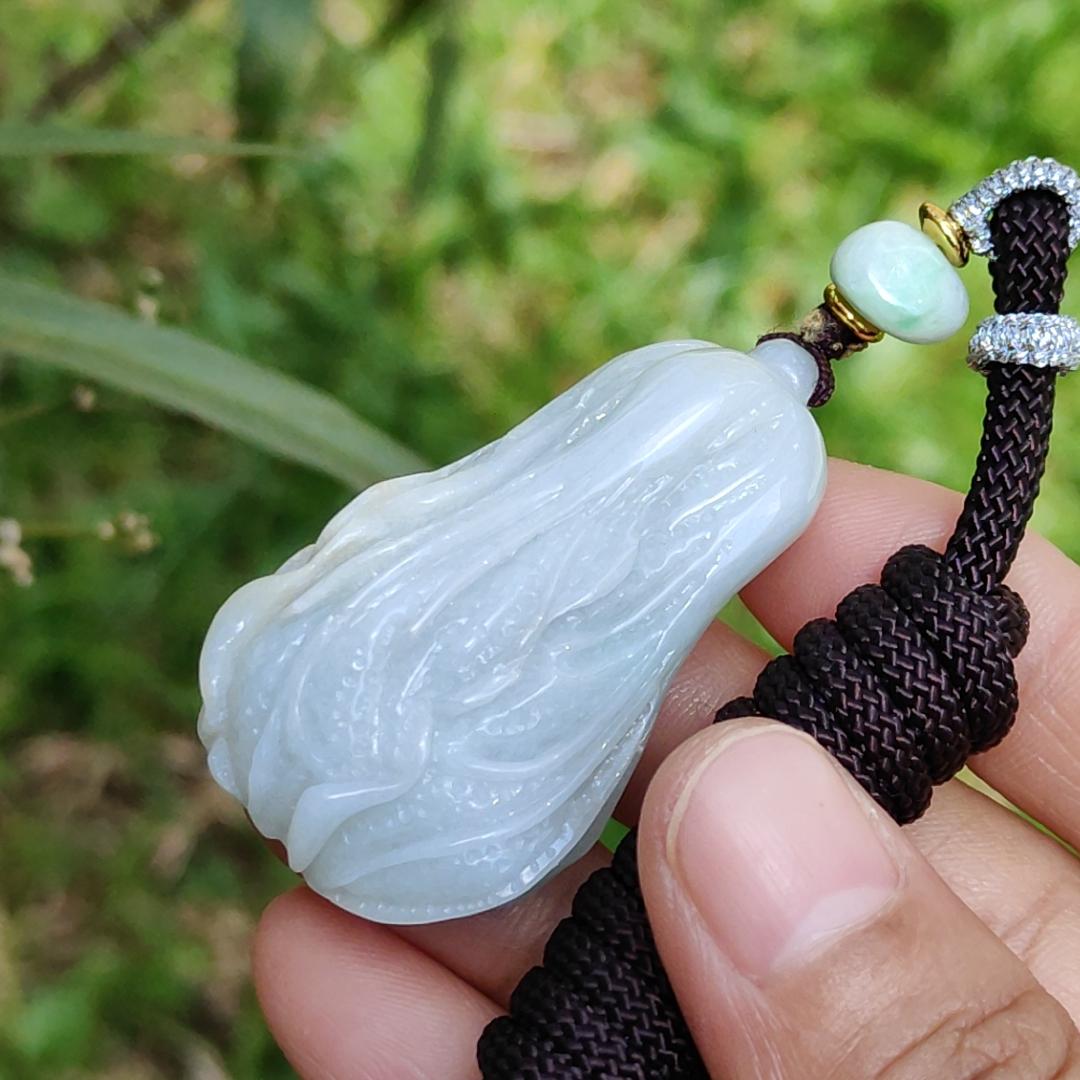 Crafted as Chinese cabbage with patches of light green Natural Type A Jadeite Pendant Necklace with QIC approved labs certificate weigh 31.92 grams, 46.8 * 27.3 * 18 mm, symbols of Boosts wealth, purity, and good weather, suitable for daily wear Yi Pin Qian