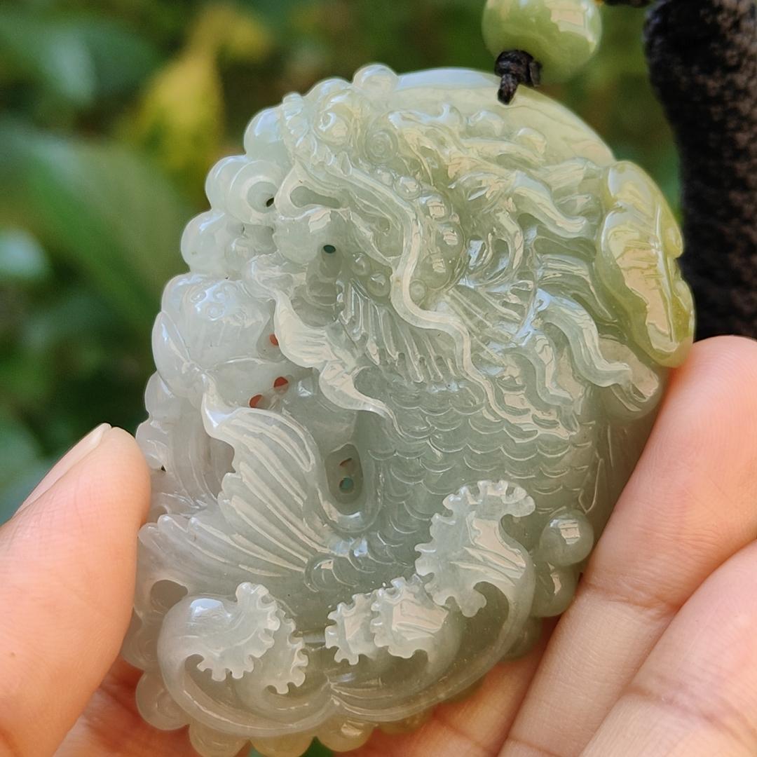 Tea Green Yellow Natural Type A Jadeite Pendant Carved as Dragon Head Fish Body meaning Prosperity, wealth and happiness with certificate weighs 49.67 grams, 62.60 * 43.50 * 12.10 mm (pendant93) Yi Pin Qian
