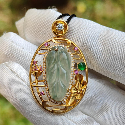 Premium Quality Icy light green with patches Natural Type A Jadeite Jade crafted as Leaf set on 18k Gold with 1 Green Cabochon and Diamonds, Certificate included weigh 4.36 grams, Measurement 35.3 * 22 * 8.2 mm (18kp25) Yi Pin Qian