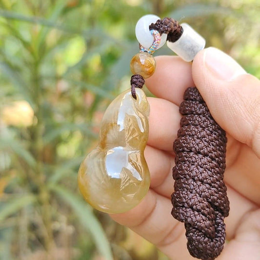 Premium Semi Icy Yellow Natural Type A Jadeite Pendant Necklace crafted as a gourd, symbols of Happiness, wealth, longevity, with certificate weigh 9.16 grams, 32.6 * 18.7 * 10.3 mm, suitable for daily wear or collection purpose Yi Pin Qian