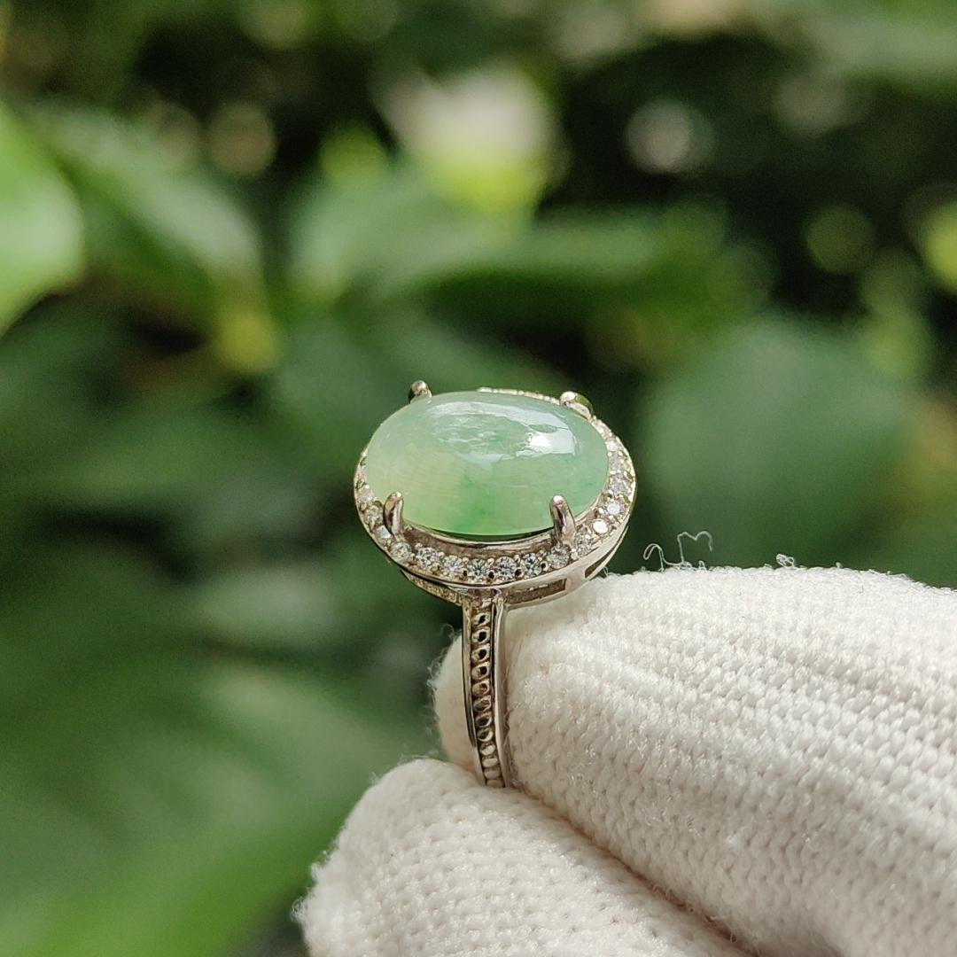Crafted as Cabochon size 10.7 * 8 * 3mm on Light Green Natural Type-A Jadeite-Jade set with S925 adjustable as Ring, QIC approved Certificate weighs 2.25 grams (s925ring18) Yi Pin Qian Jadeites Jade Jewelry ~Your Precious Quintessential ~ Singapore