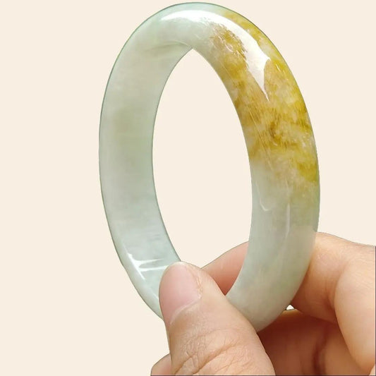 57.7 mm Crafted as Peace bangle on Burmese with light green hue and brown Natural Type A Jadeite Jade, certificate weighs 60.36 grams, Width 14mm, Thickness 7.5mm (bangle17) Yi Pin Qian Jadeites Jade Jewelry ~Your Precious Quintessential ~ Singapore
