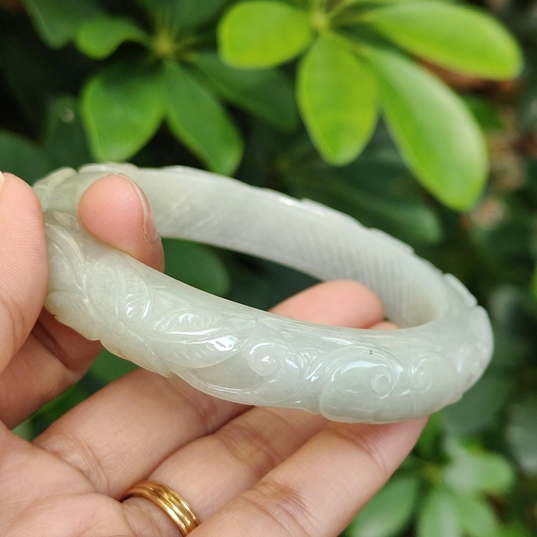 61.6 mm Crafted with patterns Peace Bangle Natural Type A Jadeite Jade certificate weighs 68.36 mm, Width 12.6 Thickness 9.6 mm (bangle24) Yi Pin Qian Jadeites Jade Jewelry ~Your Precious Quintessential ~ Singapore