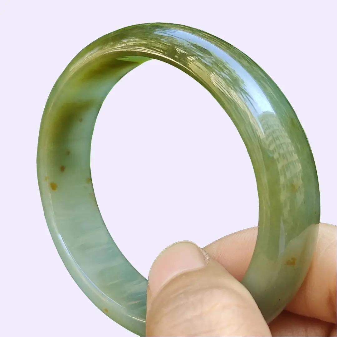 Crafted as Oval Shape bangle size 56 mm on Rare High Quality Natural Type A Jadeite Jade certificate weighs 46.53 grams, Width: 14.1 mm Thickness: 6.5 mm (bangle23) Yi Pin Qian Jadeites Jade Jewelry ~Your Precious Quintessential ~ Singapore
