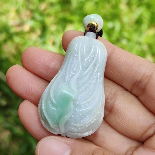 Crafted as Chinese cabbage with patches of light green Natural Type A Jadeite Pendant Necklace with QIC approved labs certificate weigh 31.92 grams, 46.8 * 27.3 * 18 mm, symbols of Boosts wealth, purity, and good weather, suitable for daily wear Yi Pin Qian