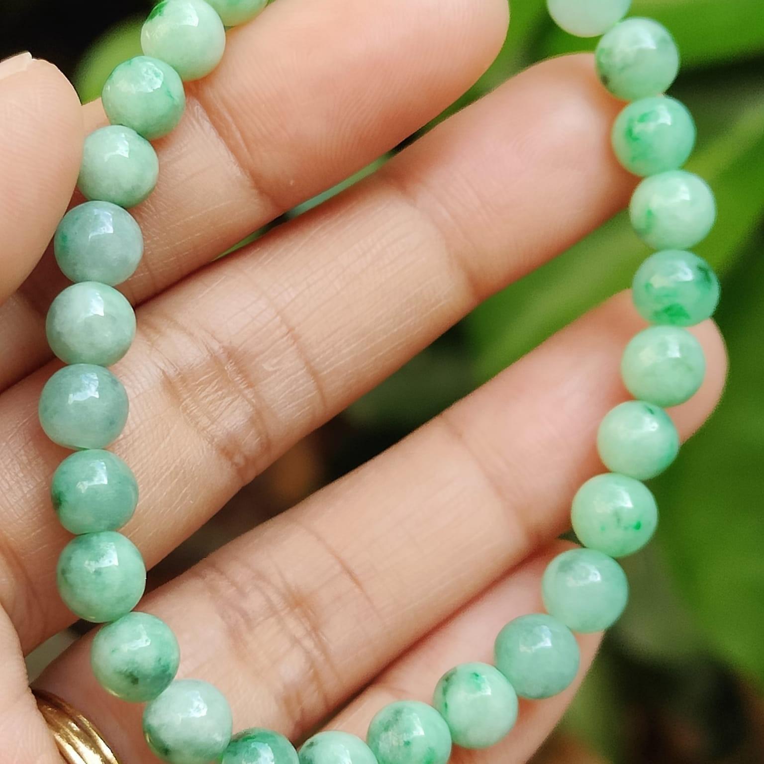 28 * 6.3 mm Light green with green patches beads Natural Type A Jadeite Jade bracelet, certificate weighs 12.64 grams (bracelet40) Yi Pin Qian Jadeites Jade Jewelry ~Your Precious Quintessential ~ Singapore