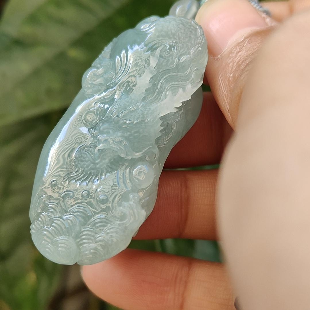 Natural Type A Jadeite Jewellery Pendant carved with dragon weighs at 30.06 grams , 50.32 * 23.30 * 12.93 mm - with Gemstone report from NGI - Very Good Translucency with faint greenish blue (pendant140) Yi Pin Qian