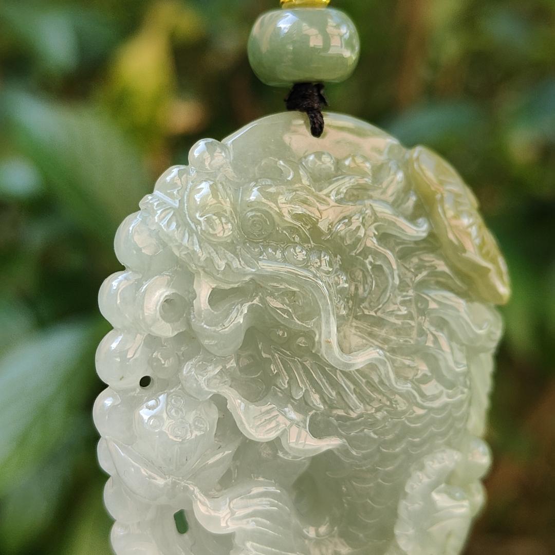 Tea Green Yellow Natural Type A Jadeite Pendant Carved as Dragon Head Fish Body meaning Prosperity, wealth and happiness with certificate weighs 49.67 grams, 62.60 * 43.50 * 12.10 mm (pendant93) Yi Pin Qian