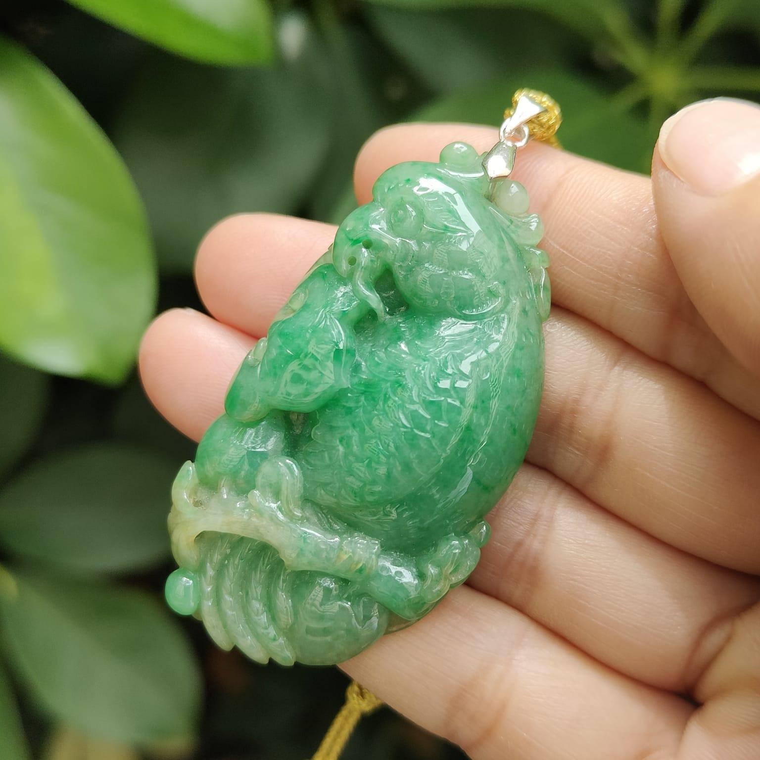 Green Natural Type A Jadeite Jade crafted with Parrot with Ruyi and Coin as Pendant, ceritificate weighs 22.55 grams, measurement 54.6 * 30 * 9.2 mm (pendant332) Yi Pin Qian Jadeites Jade Jewelry ~Your Precious Quintessential ~ Singapore