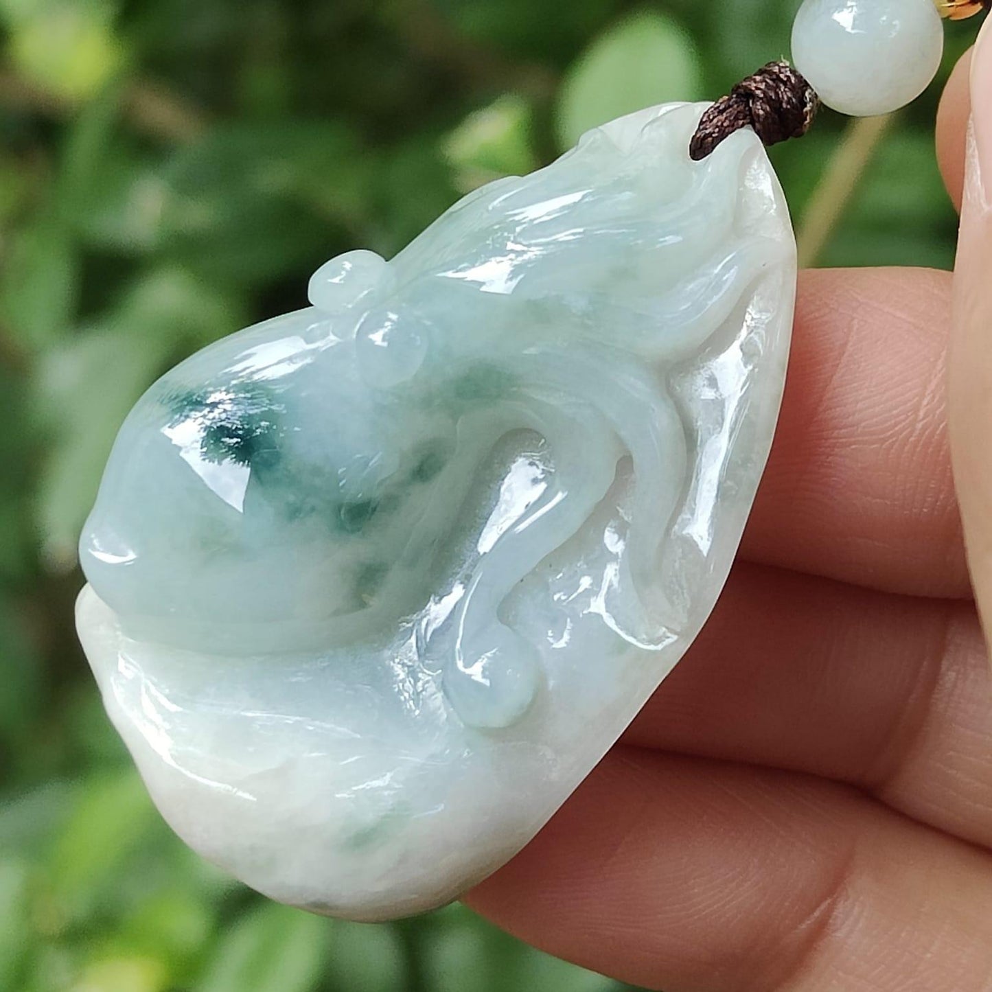 Crafted as Octopus Pendant on Natural Type A Jadeite Jade with rough skin certificate weighs 20.48 grams, measurement 38.6 * 20.3 * 17 mm (pendant354) Yi Pin Qian Jadeites Jade Jewelry ~Your Precious Quintessential ~ Singapore