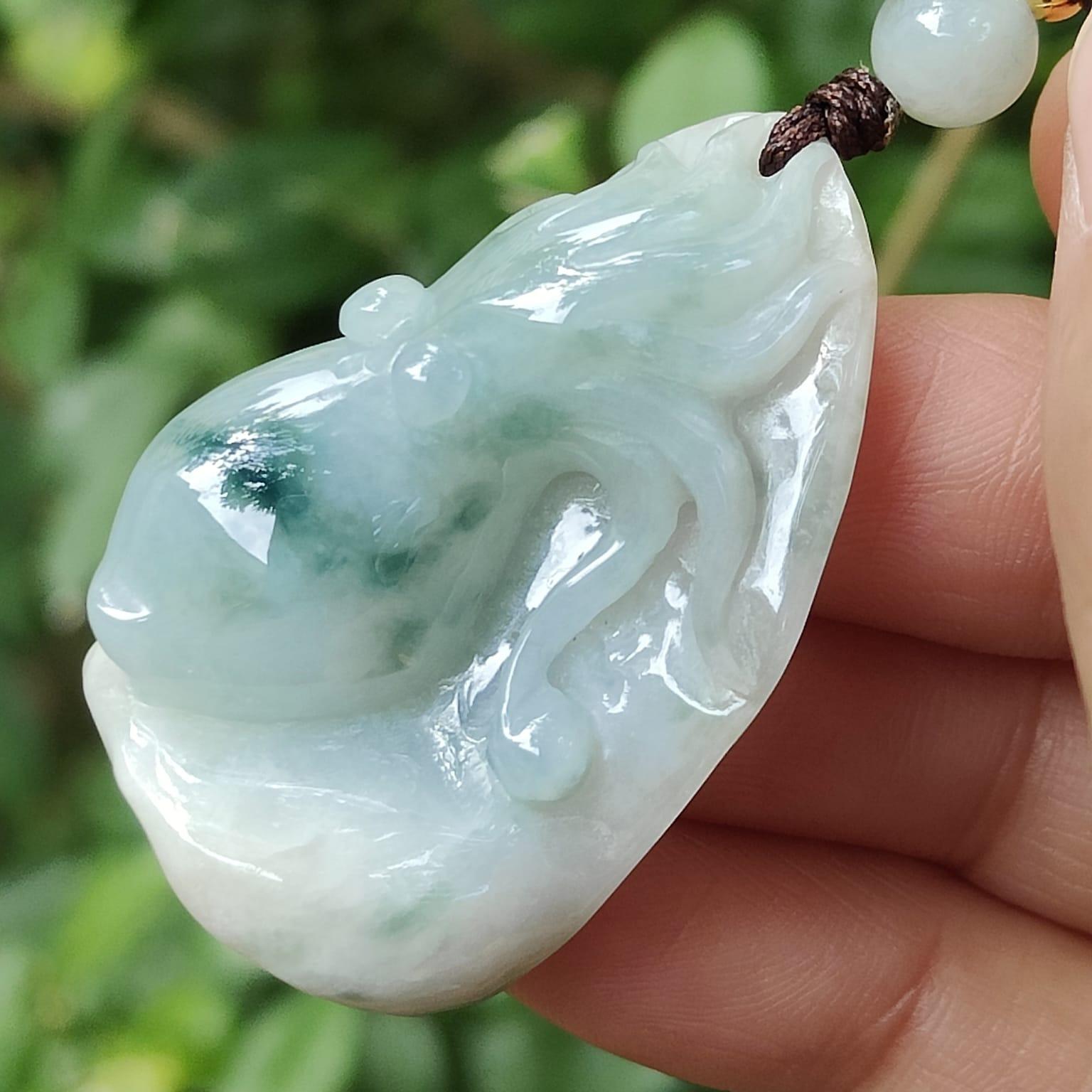 Crafted as Octopus Pendant on Natural Type A Jadeite Jade with rough skin certificate weighs 20.48 grams, measurement 38.6 * 20.3 * 17 mm (pendant354) Yi Pin Qian Jadeites Jade Jewelry ~Your Precious Quintessential ~ Singapore