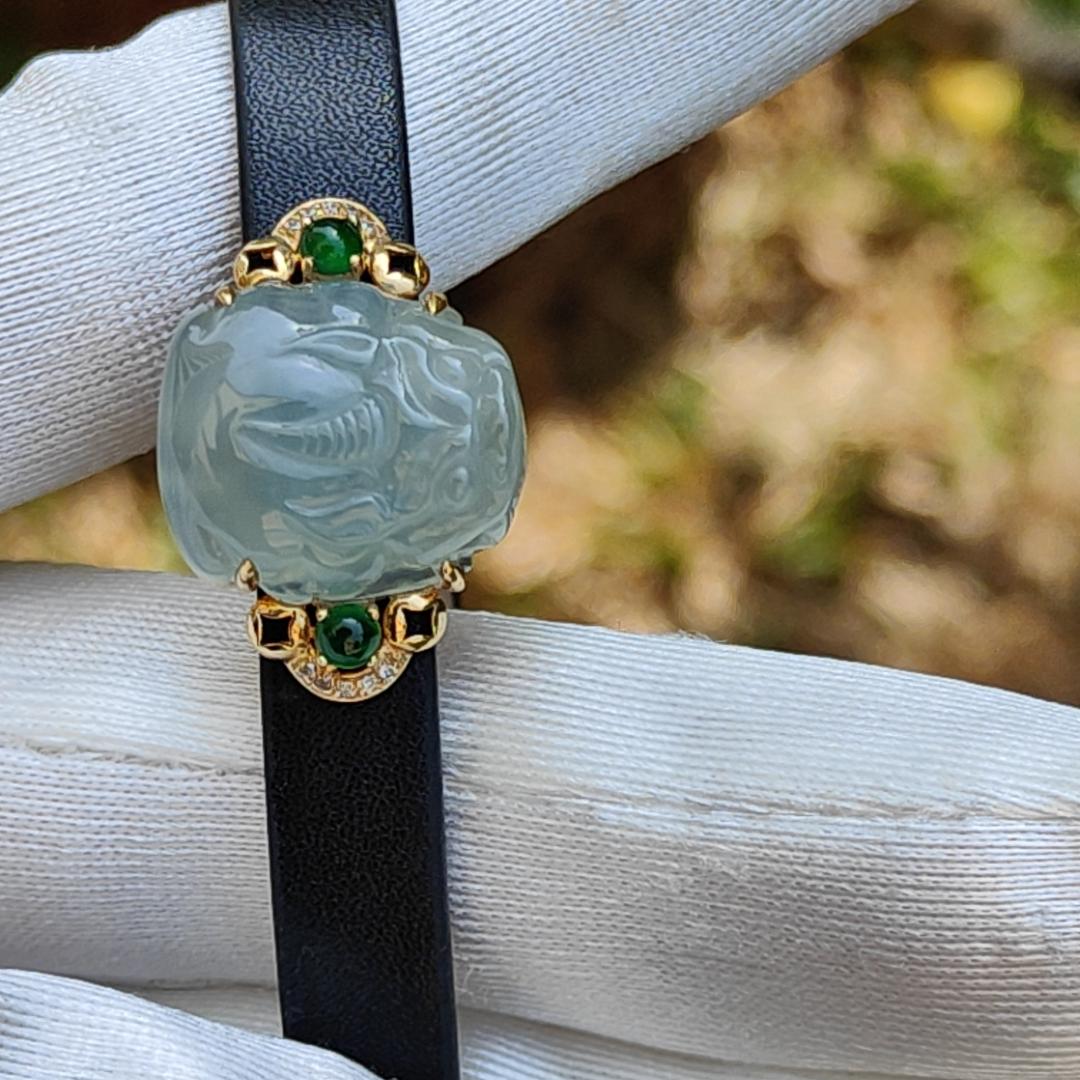 Light Green Hue Natural Type A Jadeite Jade crafted as Pixiu set on 18k Gold with 2 Green Cabochon and diamonds, adding PU wrist band upgraded elegant style bracelet, certificate weigh 4.44 grams, measurement 16.6 * 14.1 * 7.5 mm (18kpw1) Yi Pin Qian
