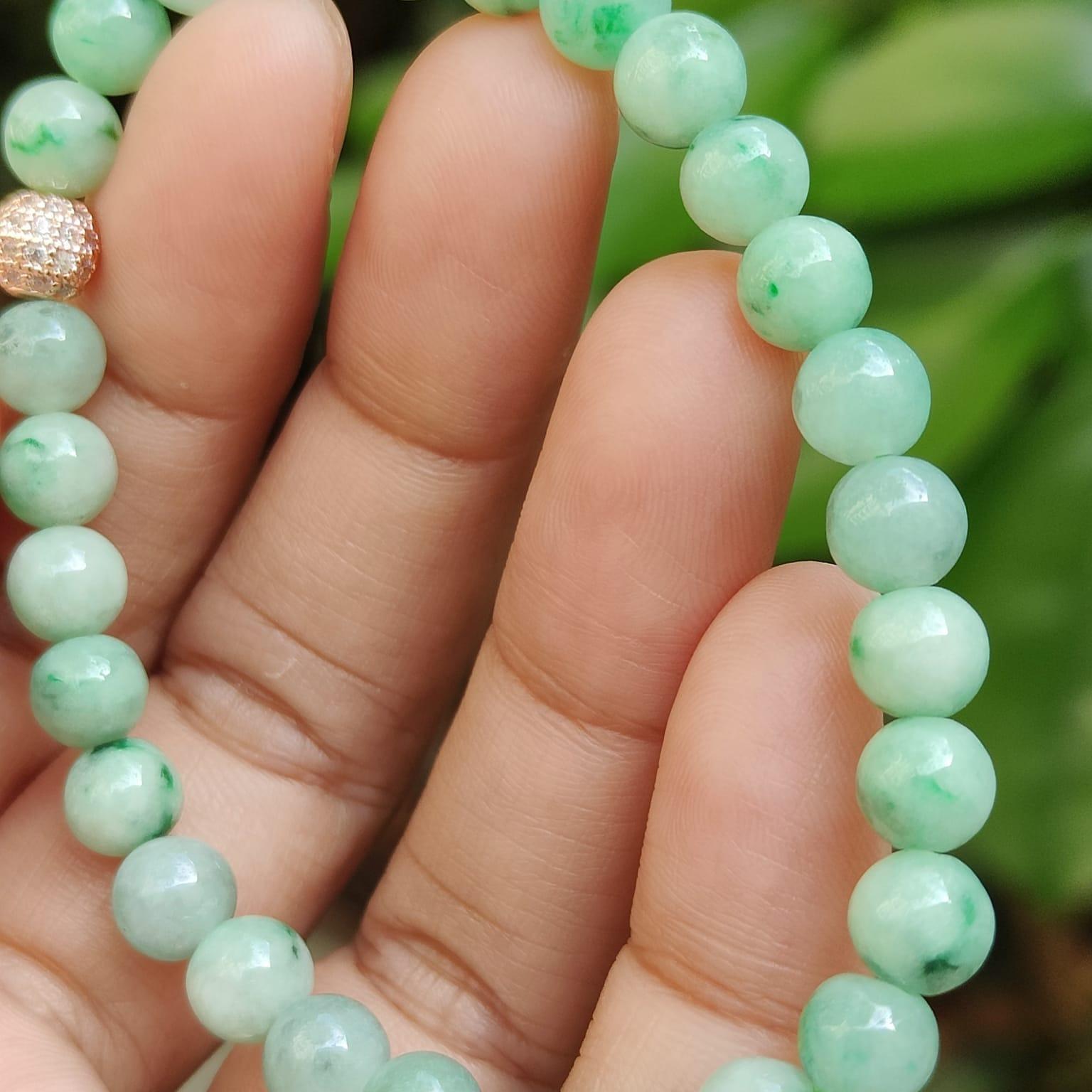 28 * 6.3 mm Light green with green patches beads Natural Type A Jadeite Jade bracelet, certificate weighs 12.64 grams (bracelet40) Yi Pin Qian Jadeites Jade Jewelry ~Your Precious Quintessential ~ Singapore