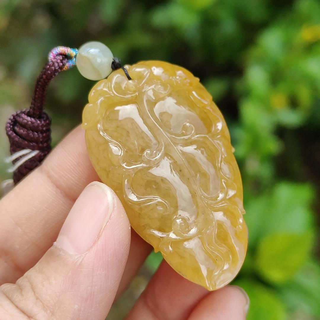 Very fine and old full Yellow Natural Type A Jadeite Pendant carved as a leave and a Mythical Beast on it with certificate weight 16.02 grams, 44 * 26 * 10 mm meaning Good luck and auspiciousness (pendant107) Yi Pin Qian