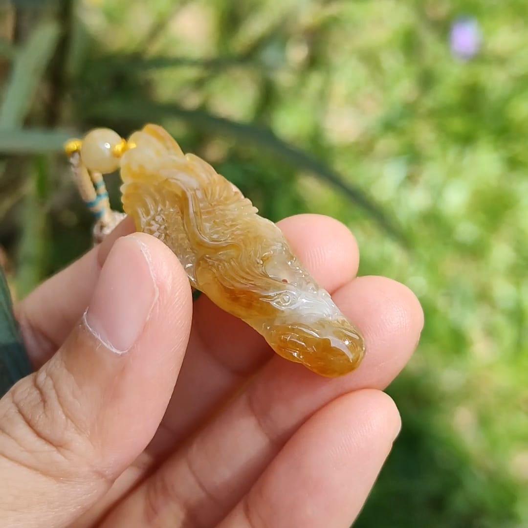 Yellow Natural Type A Jadeite crafted with Eagle and Chinese Coins symbols of Winner, Money and Luck, with QIC labs Approved certificate weigh 8.21 grams, 49.8 * 15.5 * 8.1 mm, very suitable for daily wear Yi Pin Qian