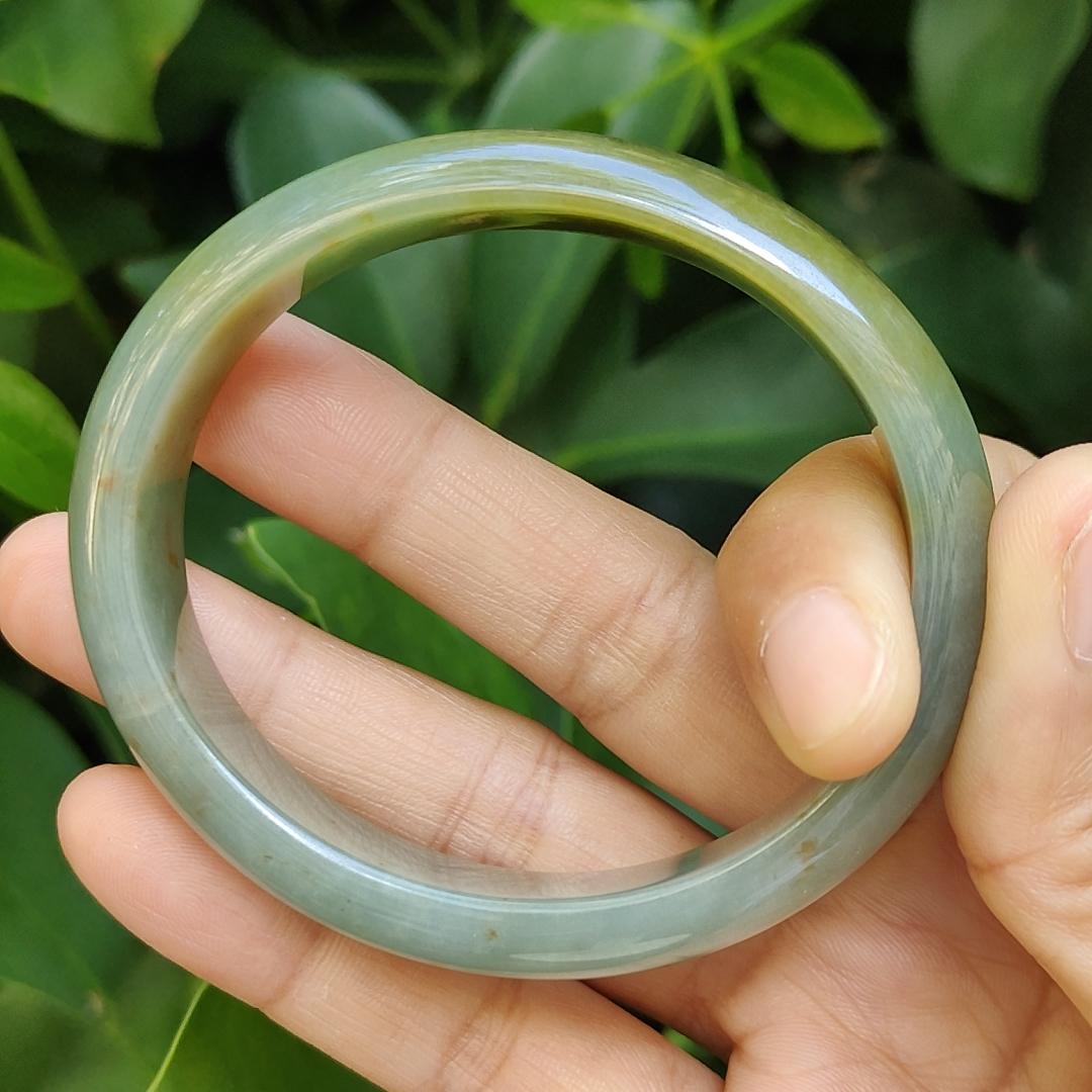 Crafted as Oval Shape bangle size 56 mm on Rare High Quality Natural Type A Jadeite Jade certificate weighs 46.53 grams, Width: 14.1 mm Thickness: 6.5 mm (bangle23) Yi Pin Qian Jadeites Jade Jewelry ~Your Precious Quintessential ~ Singapore