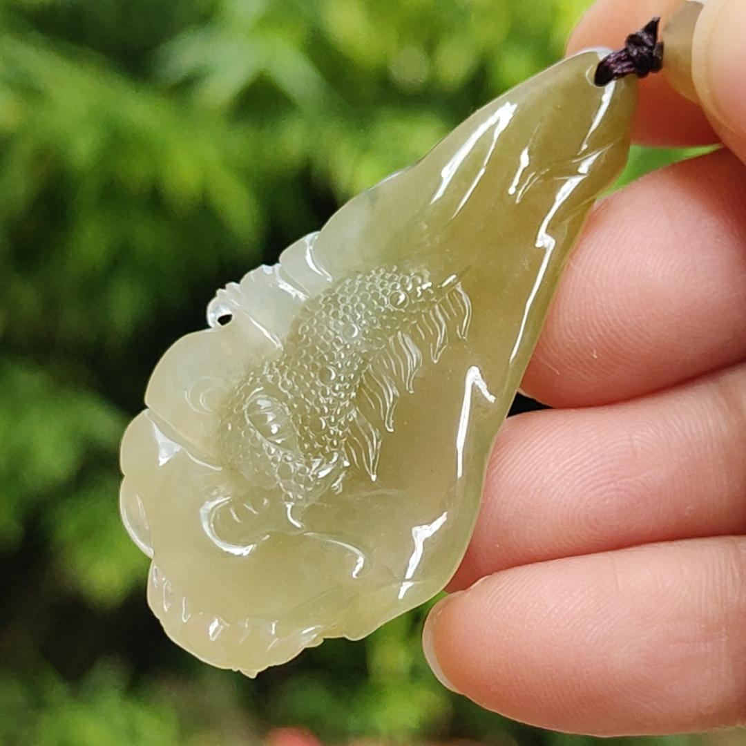 Premium Icy Yellow Natural Type A Jadeite Jade crafted with Dragon as Pendant certificate weighs 15.64 grams, measurement 50.6 * 27 * 11.5 mm (pendant253) Yi Pin Qian