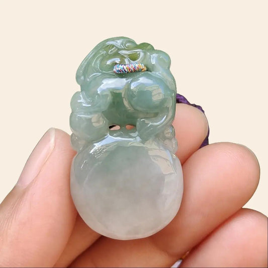Light Green Natural Type A Jadeite Jade crafted with Lion as Pendant certificate weighs 14.94 grams, measurement 36.6 * 20.5 * 10.8 mm (pendant249) Yi Pin Qian
