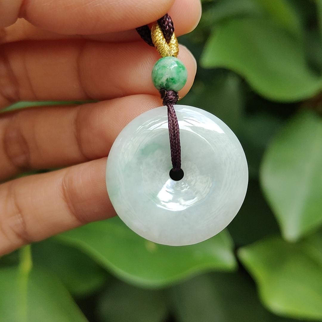 Light Green Hue with a Green Patch crafted as Donut Shape Natural Type A Jadeite-Jade Pendant, certificate weighs 5.61 grams, measurement 24.8 * 4.5 mm (pendant304) Yi Pin Qian Jadeites Jade Jewelry ~Your Precious Quintessential ~ Singapore