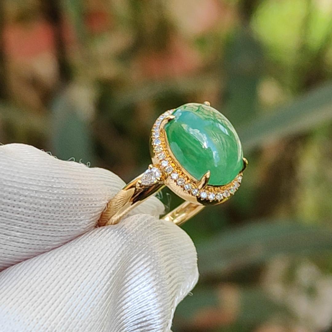 18K Gold weigh 2 grams, Setting with Natural Type A Jadeite Green Cabochon size 10.7 * 8.3 * 3.8 mm with 35 * 0.003 and 2 * 0.03 pear cut diamonds, certificate included weigh 2.65 grams, Finger ring size 17.3 mm, Yi Pin Qian