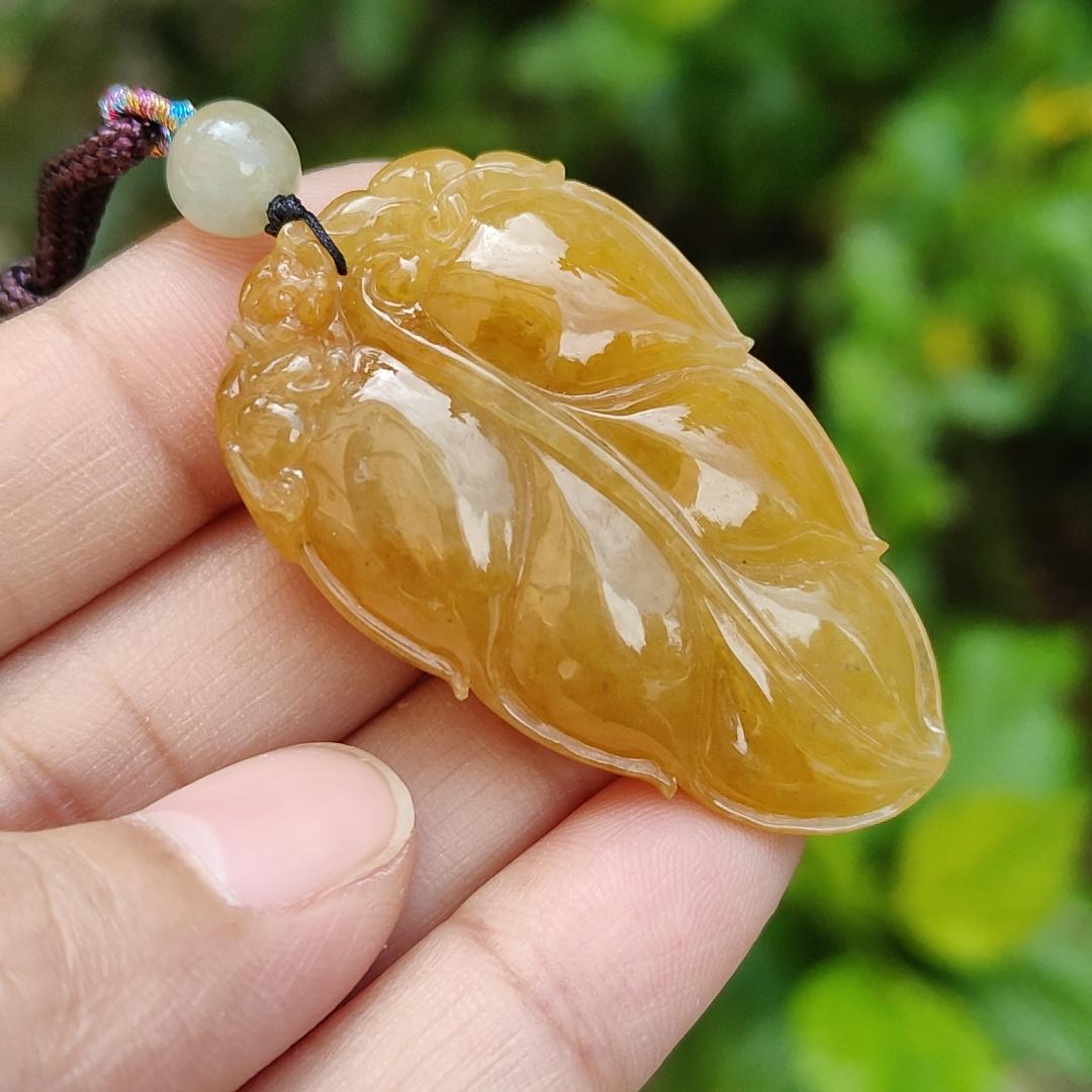 Very fine and old full Yellow Natural Type A Jadeite Pendant carved as a leave and a Mythical Beast on it with certificate weight 16.02 grams, 44 * 26 * 10 mm meaning Good luck and auspiciousness (pendant107) Yi Pin Qian
