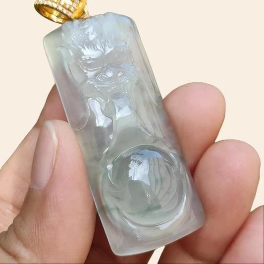 Premium Icy Translucent Light Green Natural Type A Jadeite Jade crafted with Dragon set on 18k Gold as Pendant, certificate weighs 12.99 grams, measurement 46.8 * 19.7 * 7.7 mm (18kp43) Yi Pin Qian
