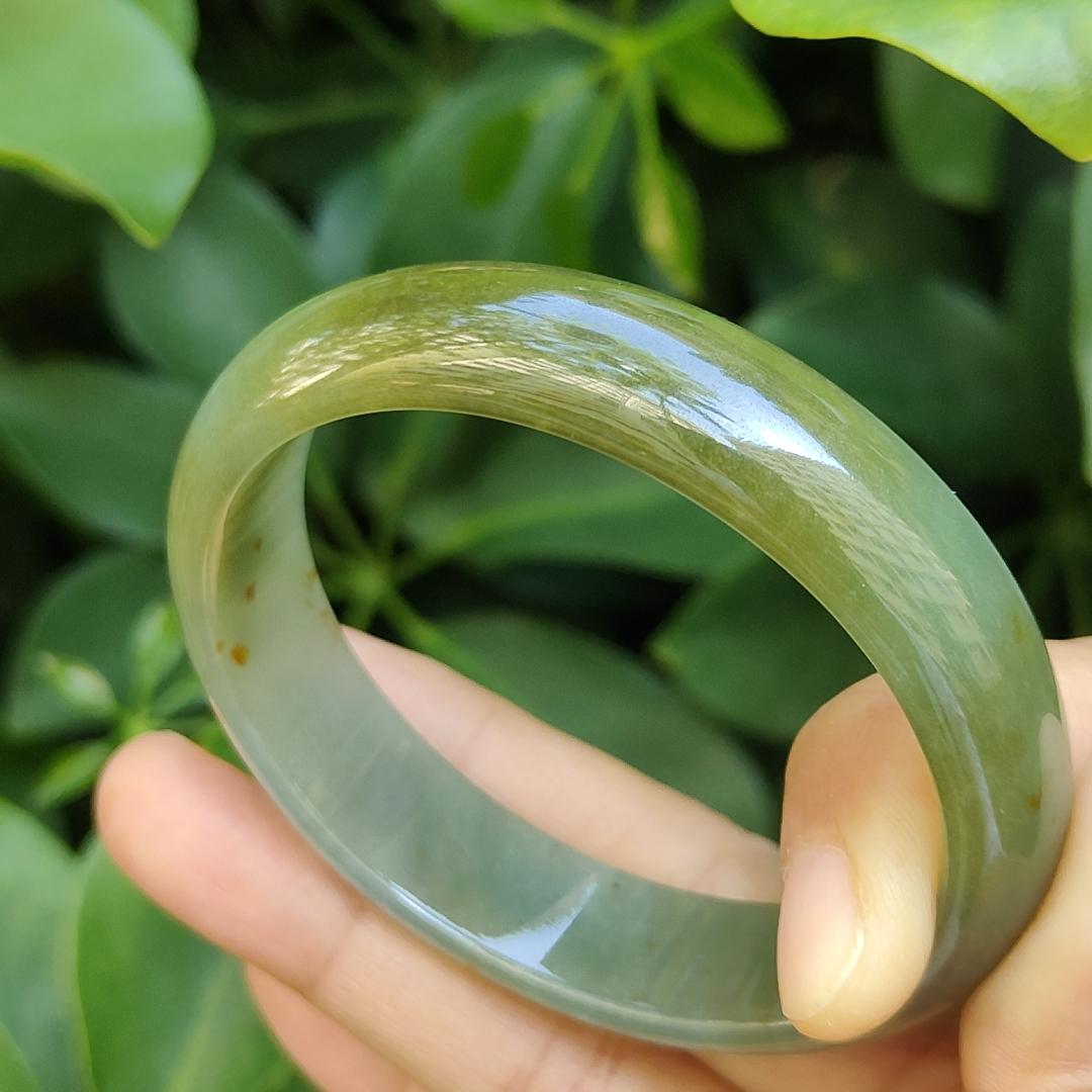 Crafted as Oval Shape bangle size 56 mm on Rare High Quality Natural Type A Jadeite Jade certificate weighs 46.53 grams, Width: 14.1 mm Thickness: 6.5 mm (bangle23) Yi Pin Qian Jadeites Jade Jewelry ~Your Precious Quintessential ~ Singapore