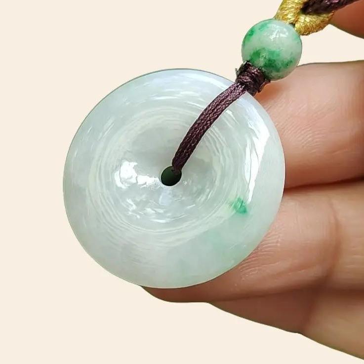 Light Green Hue with a Green Patch crafted as Donut Shape Natural Type A Jadeite-Jade Pendant, certificate weighs 5.61 grams, measurement 24.8 * 4.5 mm (pendant304) Yi Pin Qian Jadeites Jade Jewelry ~Your Precious Quintessential ~ Singapore