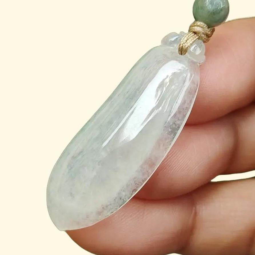 Icy Translucent Natural Burmese Jadeite Jade Crafted as Fuku Melon Pendant with light green hue, certificate weighs 4.82 grams, measurement 36.9 * 13.8 * 5.6 mm (pendant316) Yi Pin Qian Jadeites Jade Jewelry ~Your Precious Quintessential ~ Singapore