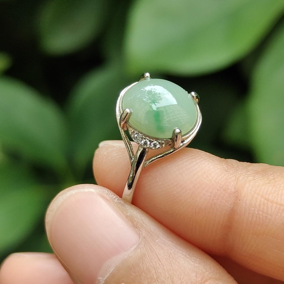 Crafted as Light Green Cabochon on Natural Type A Jadeite Jade set with S925 as Adjustable Ring certificate weighs 2.22 grams, measurement 10.3 * 8.9 * 3.4 mm (s924ring24) Yi Pin Qian Jadeites Jade Jewelry ~Your Precious Quintessential ~ Singapore